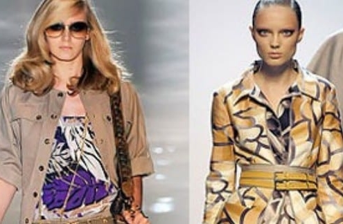 Four female runway models dressed in high-fashion - but very inappropriate - safari outfits