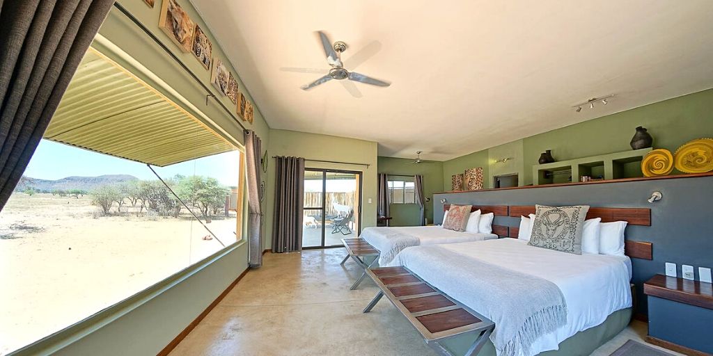 okonjima plains camp luxurious bedroom with view